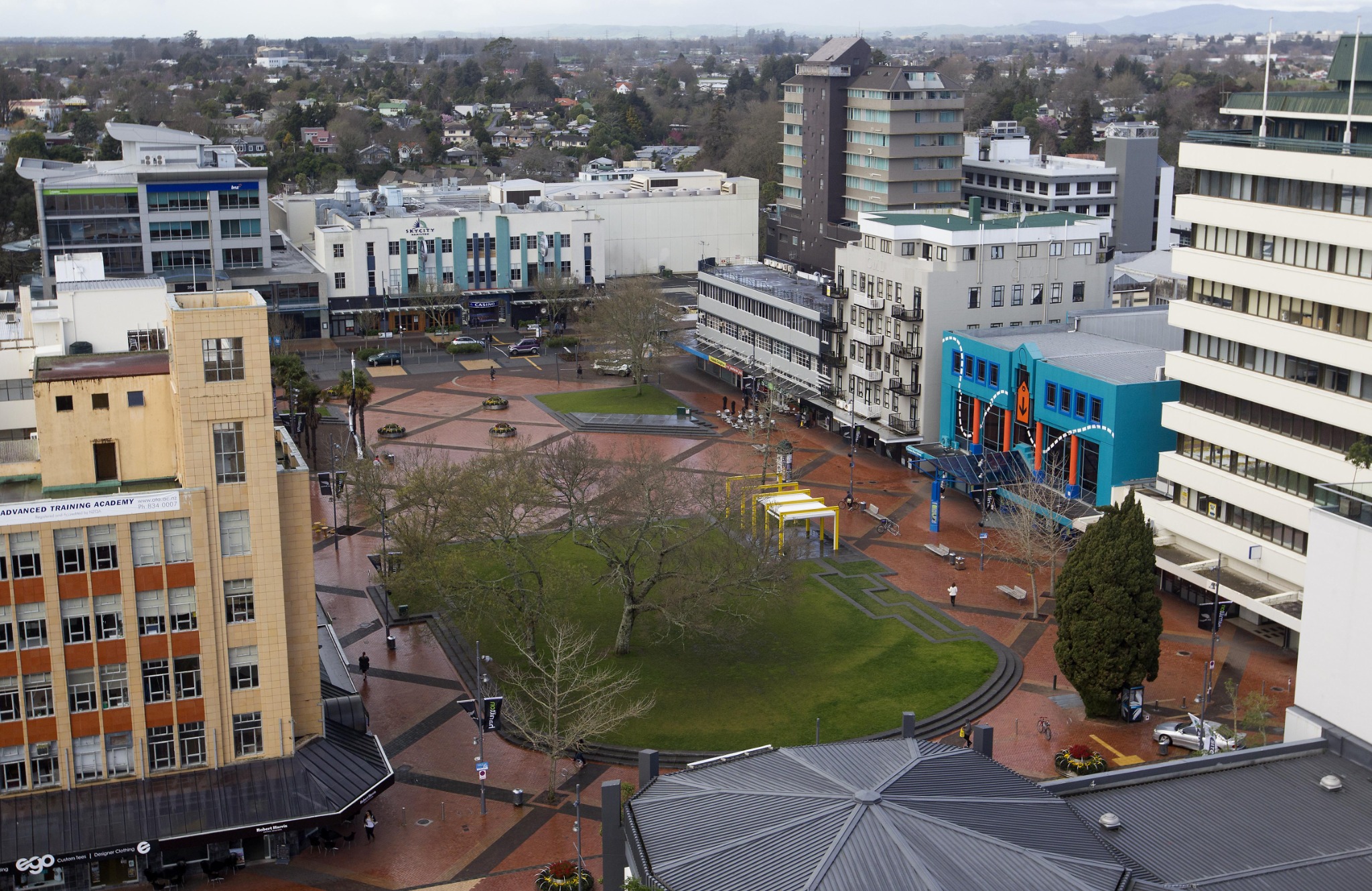 Elevated view across the whole lawn and paved plaza at Garden Place