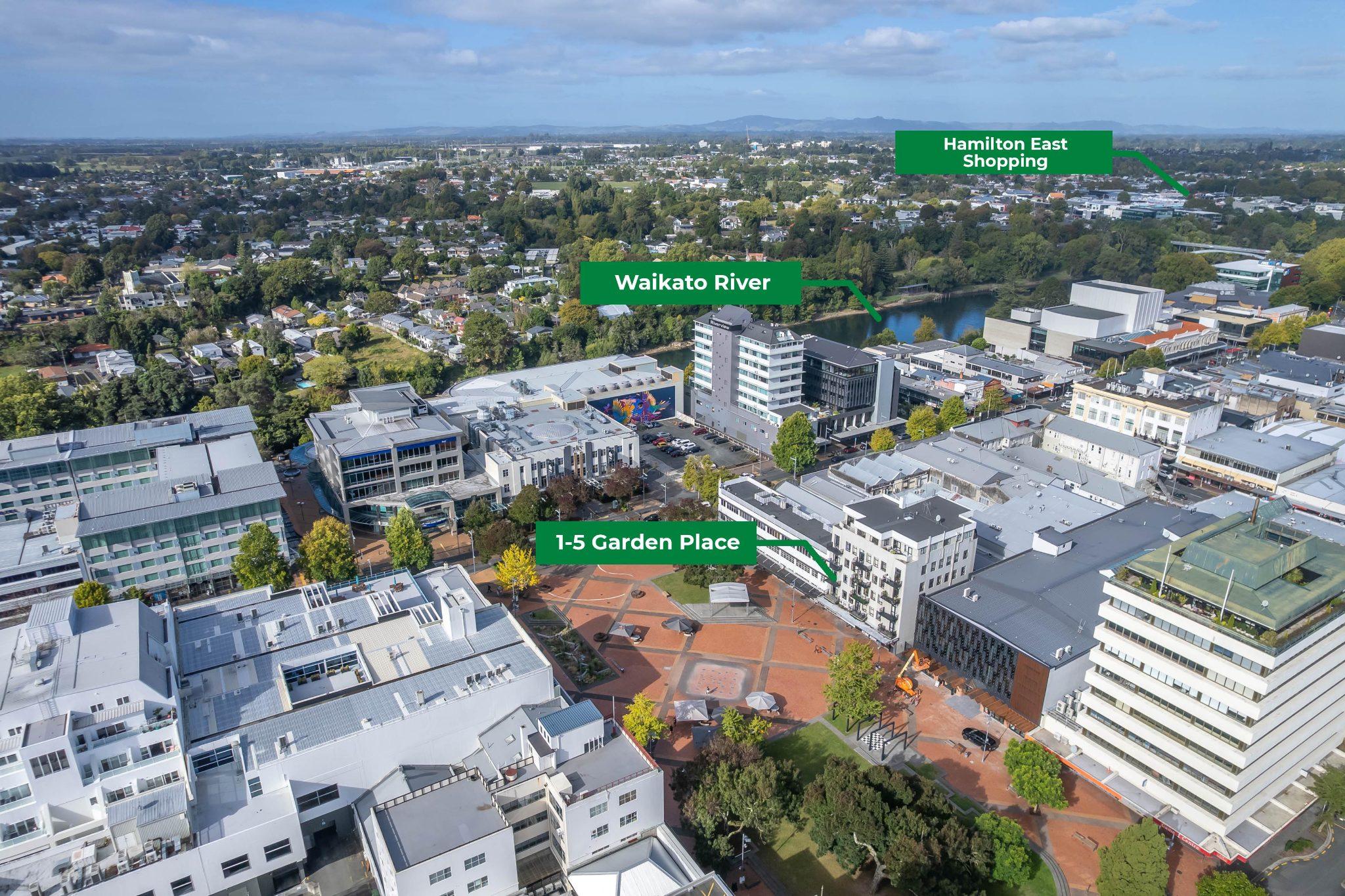 Aerial photograph with supplied labels showing Garden Place in the foreground, the Waikato River and Hamilton East